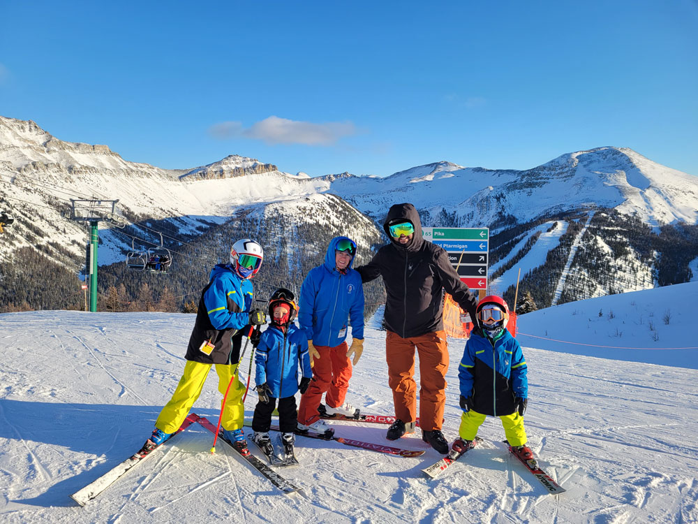 BART Ski Team coaches with 3 athletes